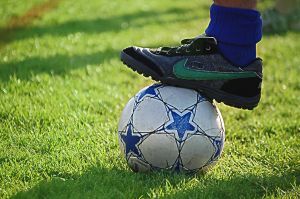 Adult Foot on Soccer Ball